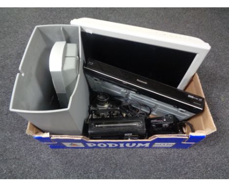 A box containing Panasonic TV and Panasonic DVD player with remotes, cameras, Pure digital radio, together with a paper shred