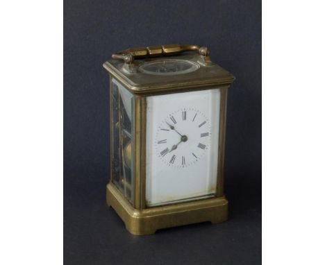 A brass gong-striking carriage clock, 5" high excluding handle - a/f.