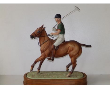 A Royal Worcester Doris Lindner porcelain equestrian group - 'The Duke of Edinburgh' playing polo, 15" high overall including