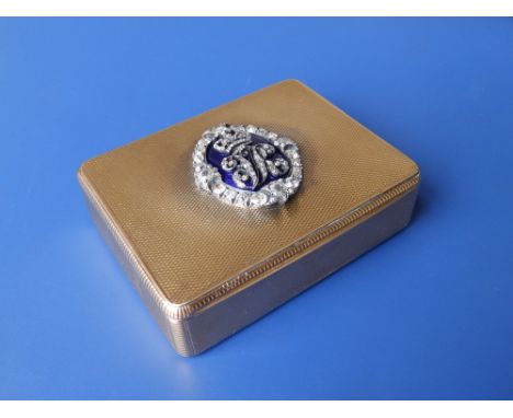 A Regency 18ct gold box with royal cypher to hinged cover  marked out in old cut and rose cut diamonds on an oval blue enamel