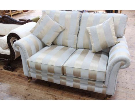 Two seater settee in striped fabric.