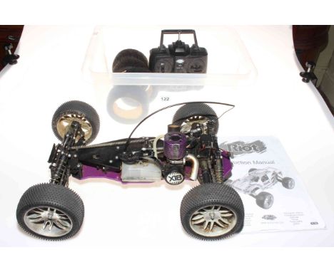 Riot Schumacher Racing petrol buggy X18 performance engine with instructions, remote control and four spare tyres.