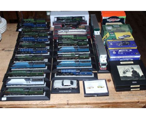 Collection of Corgi and other model trains, two Eddie Stobart model trucks, Atlas and other model vehicles.