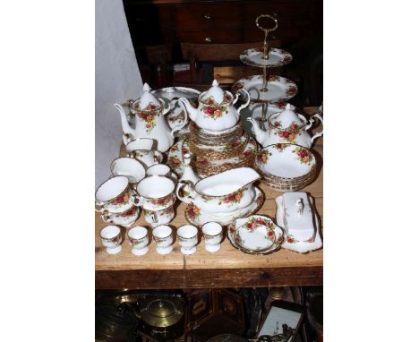 Royal Albert Country Roses including teapot, tureen, butter dish, approximately fifty pieces.