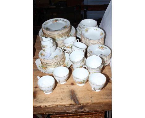 Coalport Wenlock fruit decorated part dinner and tea service, approximately eighty pieces.
