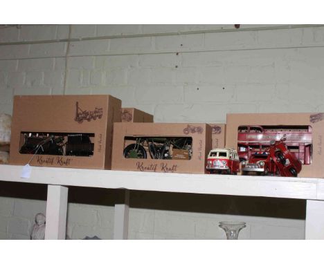 Six Kreatif Kraft hand painted model vehicles and three similar metal vehicles.