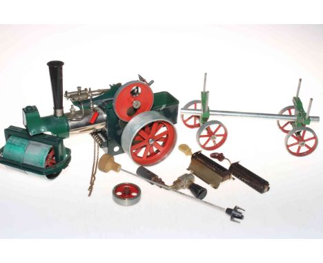 Steam roller and trailer.
