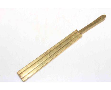 Oriental Tanto, the brass scabbard and handle with engraved stork and foliage decoration, 31cm length.