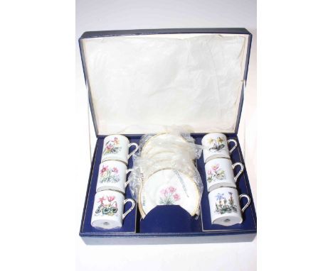 Royal Worcester floral design six cups and five plates in box.
