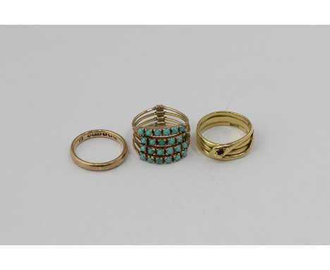 An 18ct gold and ruby snake ring, a 9ct gold wedding ring, a turquoise set four-band ring