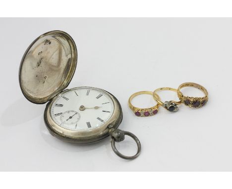A ruby and diamond ring; a sapphire and diamond ring (a/f); a garnet and pearl ring; and a silver watch