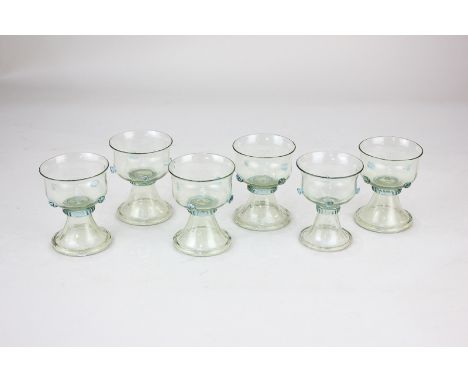 A set of six early 20th century James Powell & Sons Whitefriars liqueur glasses, designed by Harry Powell, in pale green with