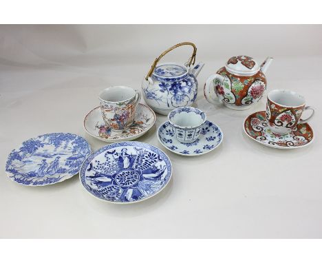 A Chinese small porcelain teapot and matching cup and saucer (a/f), a blue and white teapot, tea bowl, four various small dis