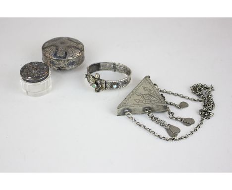 A Middle Eastern silver and niello spice box with foliate decoration, a base metal triangular spice box on chain, a turquoise