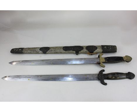 An unusual Eastern short sword, separating into two swords, with 16.5 inch blade, flat back horn handles and hilts, in single