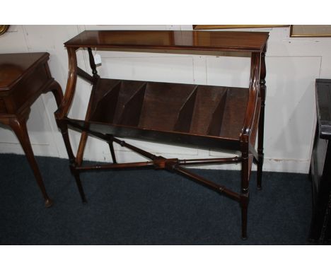 A mahogany book trough with rectangular top, five division rack beneath, on turned legs and X-framed supports and stretchers,