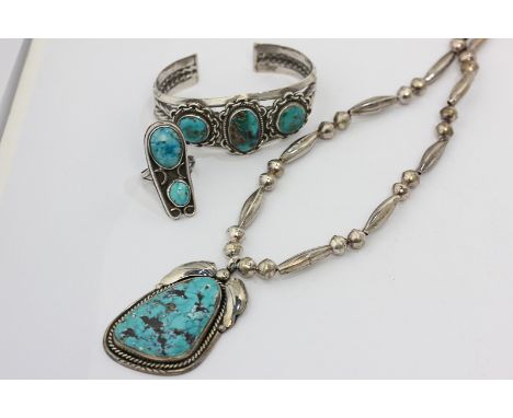 A silver mounted turquoise Matrix necklace, a similar open end bangle, and two-stone ring