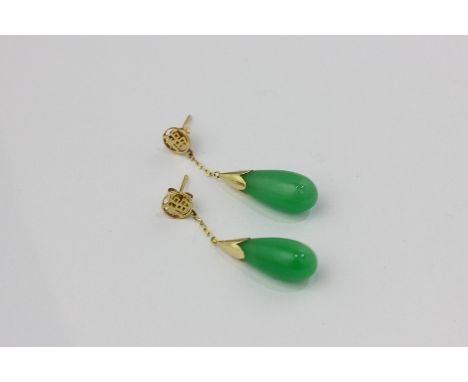 A pair of Chinese jade drop earrings, the gold fittings pierced with Chinese characters