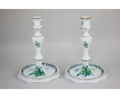 A pair of Herend Hungarian porcelain candlesticks in Chinese Bouquet green pattern, the baluster form with hole for lamp fitt