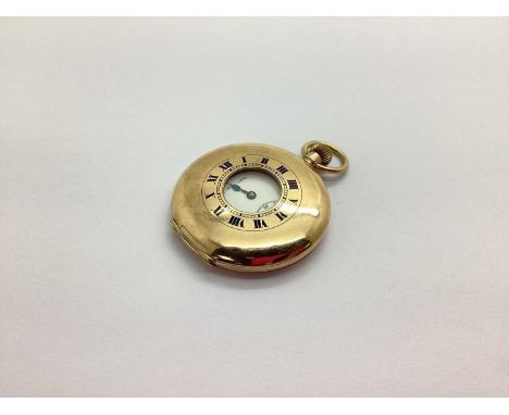 Record; A 9ct Gold Cased Half Hunter Pocket Watch, the signed white dial with black Roman numerals and seconds subsidiary dia