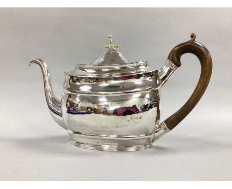 A Georgian Hallmarked Silver Tea Pot, Peter &amp; Wiliam Bateman, London 1806, of plain oval form with gadrooned egde, scroll