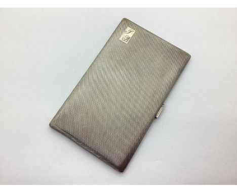 A Hallmarked Silver Cigarette Case, Birmingham 1952, of slim rectangular form, allover engine turned and initialled, gilt lin