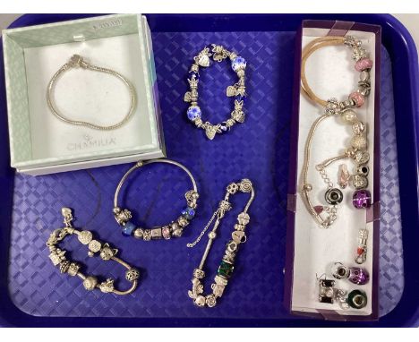 Charm Company Sliding Charm Bangle, together with other modern sliding charm bracelets, etc.