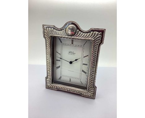 A Modern Hallmarked Silver Mounted Clock, R Carr, Sheffield 1994, of shaped rectangular form, freestanding wooden back with b