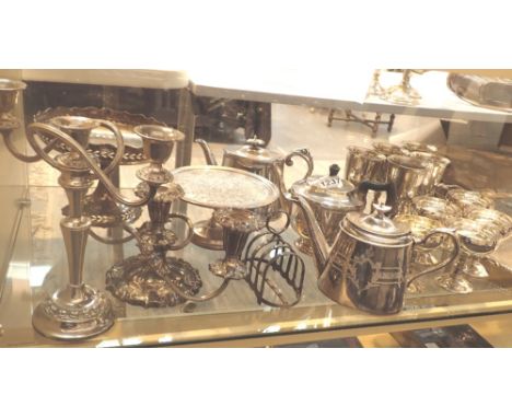 Large quantity of silver plated items including candelabra, tea sets, goblets etc