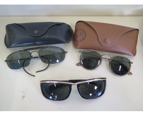 Two pairs of USA made vintage Rayban sunglasses, with b and L lenses, one pair are 1992 Olympic games series in good conditio