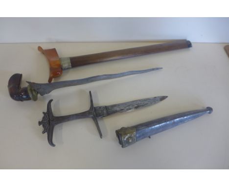 A kris with scabbard, blade length 31cm and an Eastern dagger with scabbard, 29cm long, please see images for condition 