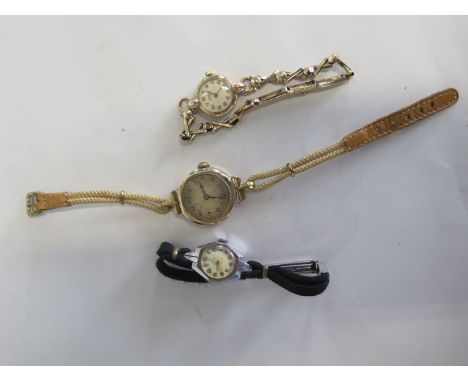 Two 9ct manual wind wrist watches, total weight approx 29 grams including movement and straps, on running, and a ladies Tudor