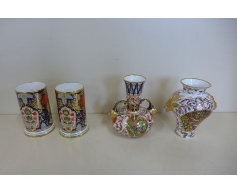 A pair of Lynton porcelain Imari spill vases - 10cm tall, and two Derby vases, spill vases some wear to gilt, chip to base on