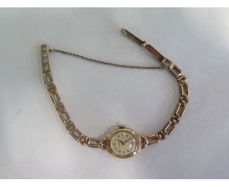A ladies Rotary 9ct gold cocktail watch, approx 12.7 grams overall, with usage marks, not currently running 