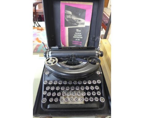 A portable Remington Noiseless typewriter, with case and typewriting manual, not tested