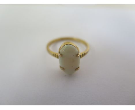 A 9ct ring set with single opal stone, size N, approx 2.2 grams, in good condition 