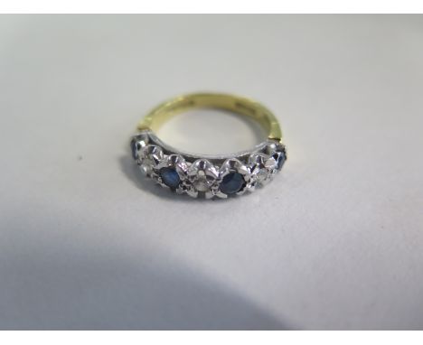 An 18ct yellow gold diamond and sapphire ring, size K, approx 3.7 grams, some usage marks but generally good 