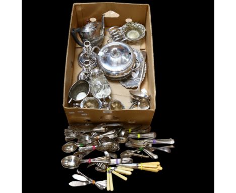 A quantity of various silver plate, including a tureen and cover, toast racks, pair of candlesticks, teaware, plated ladle, p