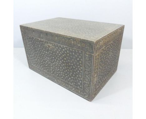 An antique Indian camphorwood trunk, with painted floral decoration. 89x54x59cm.Some loss to the lacquered outer shell, and v
