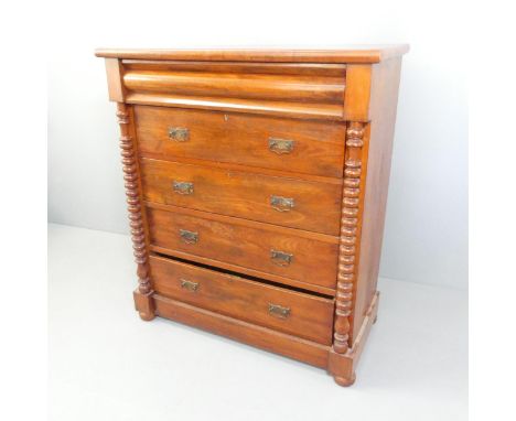 A Victorian mahogany Scottish chest, with ogee frieze drawer, 4 further long drawers under, bobbin turned pilasters, and rais