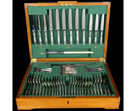 An Art Deco canteen of silver plated cutlery, setting for 6 people, including carving set, retailed by Harrods Ltd (55 pieces