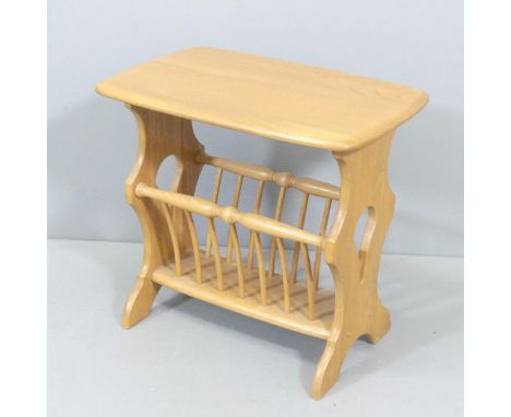 ERCOL - A Windsor magazine rack / side table. 55x51x36cm.