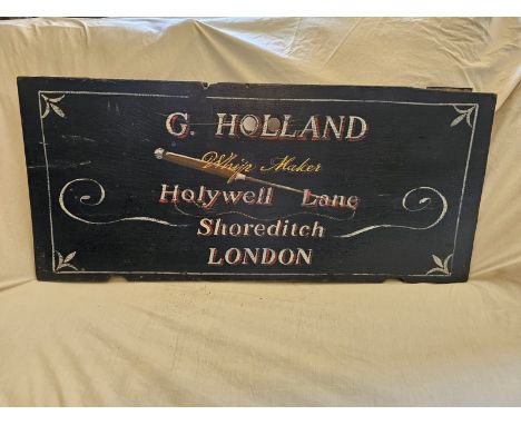 Painted wooden shop advertising sign for G.Holland whip maker of Shoreditch. 36 x 16".