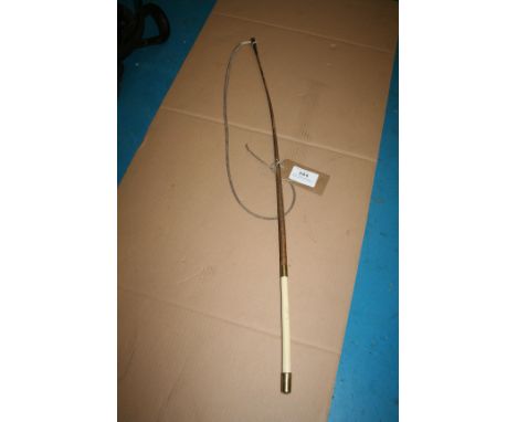 Steel lined dealer's whip with bone handle