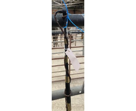 In-hand whip with brass ferrules. This lot carries VAT.