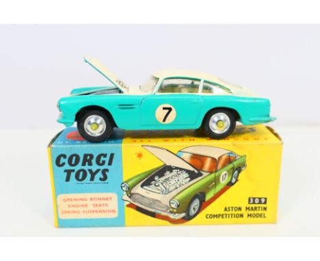 Corgi - boxed diecast model Corgi #309 Aston Martin Competition Model. The model has some storage dust and may benefit from a