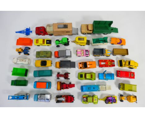 Matchbox - Husky - An unboxed group of playworn diecast model vehicles. Lot includes Husky Chitty Chitty Bang Bang; Matchbox 