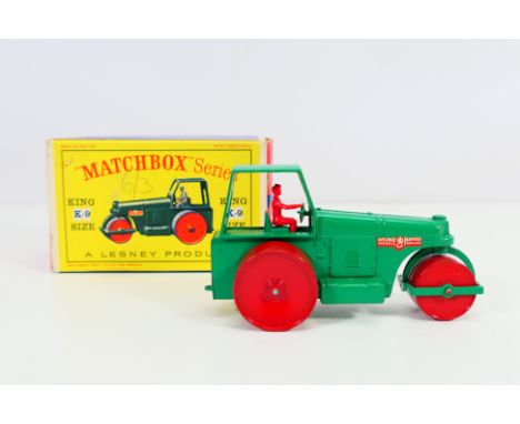 Lesney Matchbox - a boxed diecast King Size K-9 Aveling Barford Roller in red and green. A corner of one transfer has come aw