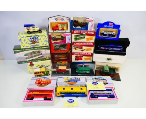 Atlas - Oxford - Matchbox - Corgi - A group of boxed models including Blackpool Balloon Tram, Unimog, Bedford OB Coach and mo