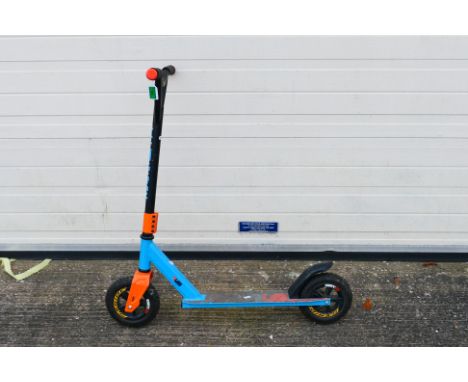 Mammoth - A children's Mammoth Dirt Scooter - The scooter shows signs of use and play appearing Fair overall. (This does not 
